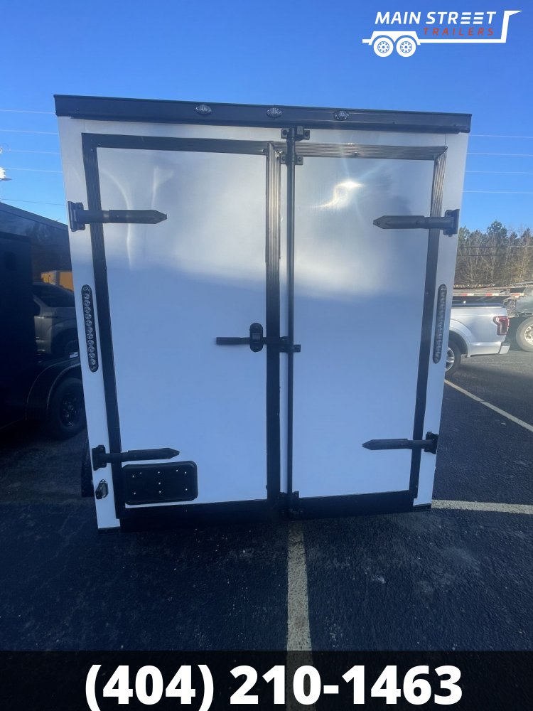 6X10T/A WHITE WITH BLACKOUT AND BARN DOORS