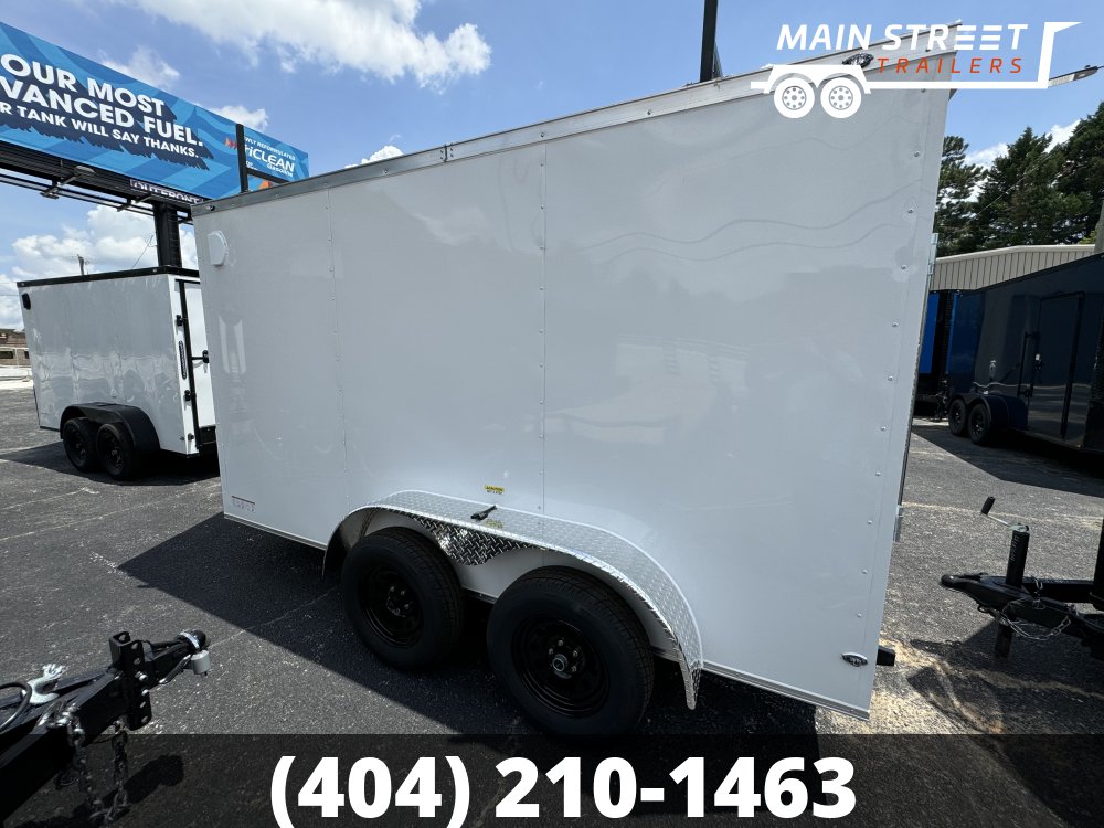 6X12 T/A WHITE WITH LADDER RACKS AND RV AND BARLOCK