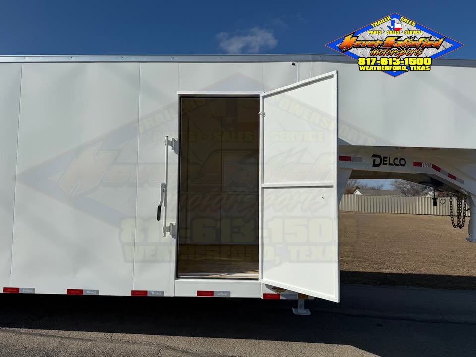 2027 DELCO E224 8' X 24' GOOSENECK ENCLOSED CARGO TRAILER WITH SPRING ASSISTED RAMP GATE AND SPARE 1