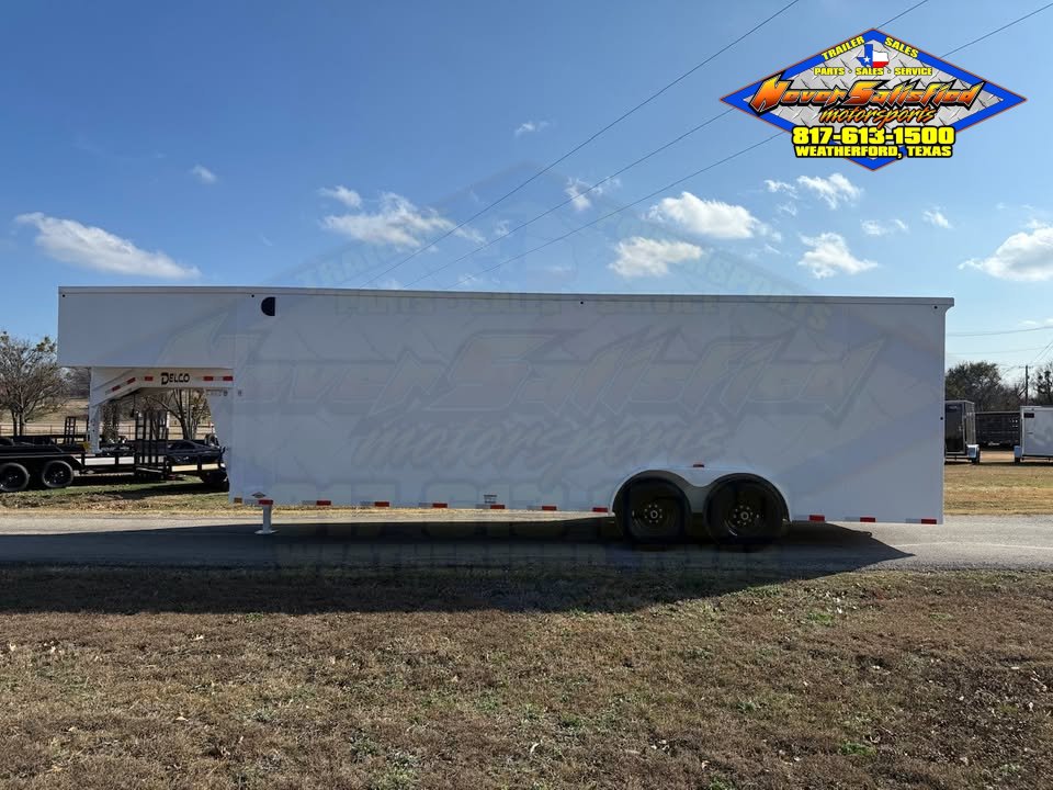 2027 DELCO E224 8' X 24' GOOSENECK ENCLOSED CARGO TRAILER WITH SPRING ASSISTED RAMP GATE AND SPARE 1