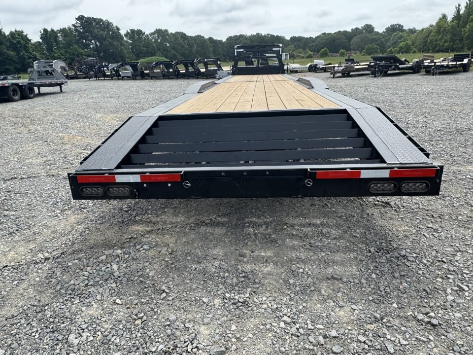 2026 RawMaxx LDX 102X44 LOWBOY W/14 PLYS, LOCKING CHAIN RACK, AND TORQUE TUBE 21K GVWR GOOSENECK Fla