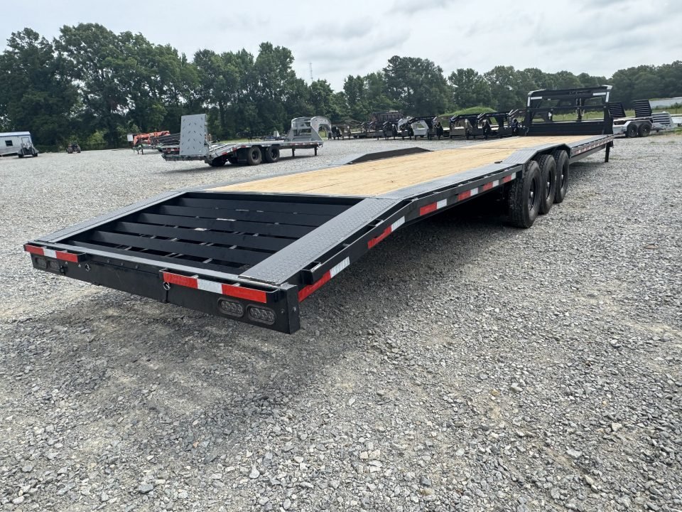 2026 RawMaxx LDX 102X44 LOWBOY W/14 PLYS, LOCKING CHAIN RACK, AND TORQUE TUBE 21K GVWR GOOSENECK Fla