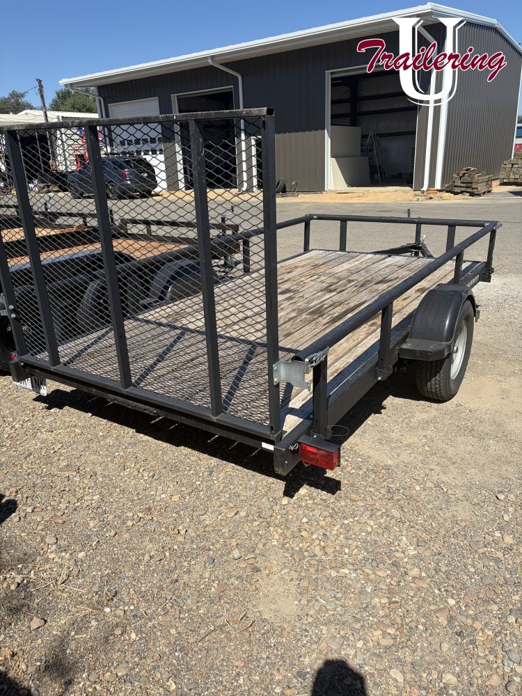 2023 Karavan multi function atv/utility trailer. Sides and front tip out. Good shape