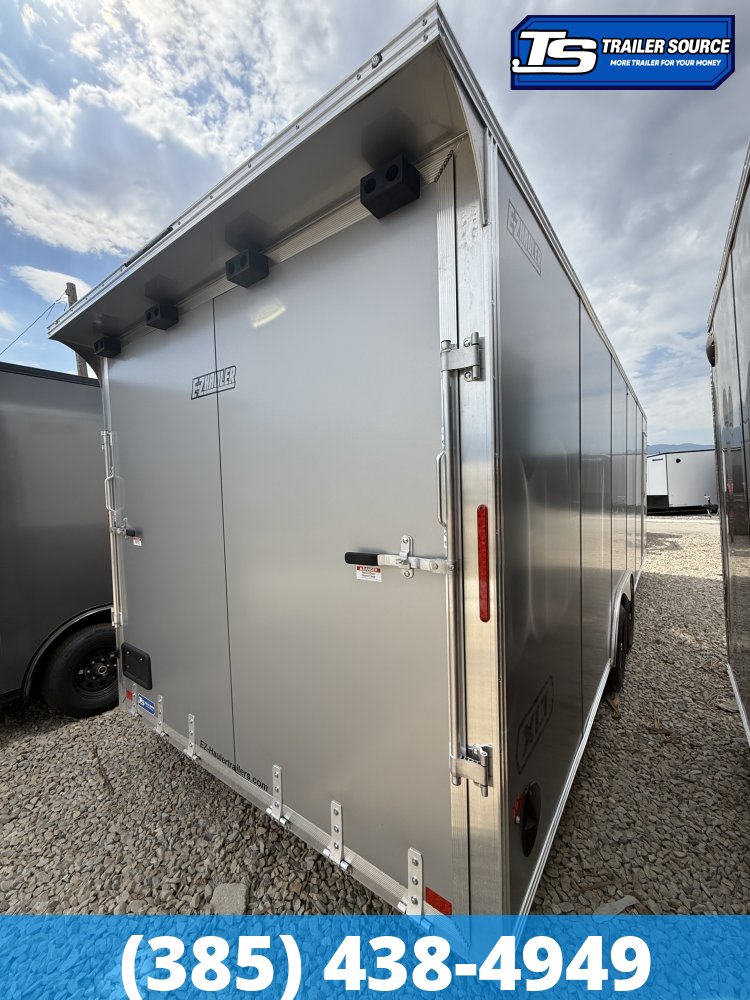 8.5x24 Alcom Aluminum EZ Hauler XLT Auto Trailer - 7'0" Interior - 10K GVWR - .080 PolyCor, Rear Spoiler, Translucent Roof, Ultimate Escape Door