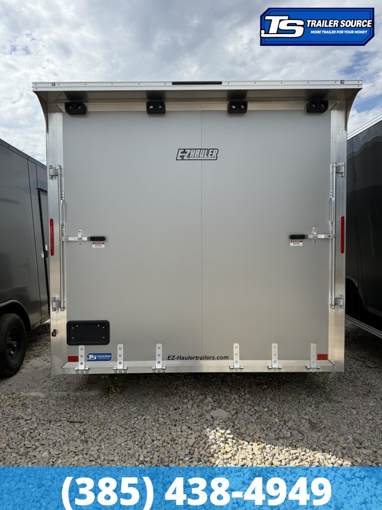 8.5x24 Alcom Aluminum EZ Hauler XLT Auto Trailer - 7'0" Interior - 10K GVWR - .080 PolyCor, Rear Spoiler, Translucent Roof, Ultimate Escape Door
