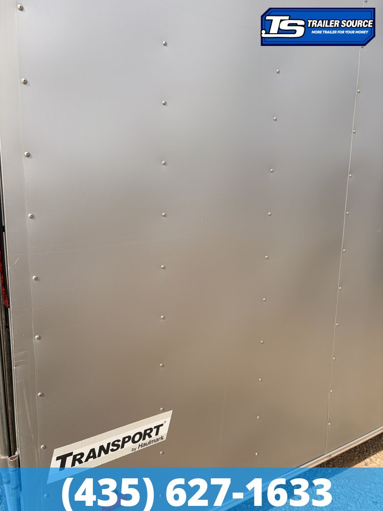 8.5x24 Haulmark Transport Enclosed Cargo Trailer - 10K GVWR - Lower Cabinet, Roof Vent, Stabilizer Jacks, Upper Cabinet