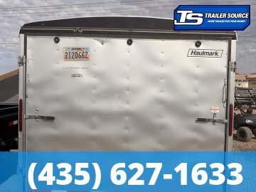 8.5x24 Haulmark Transport Enclosed Cargo Trailer - 10K GVWR - Lower Cabinet, Roof Vent, Stabilizer Jacks, Upper Cabinet