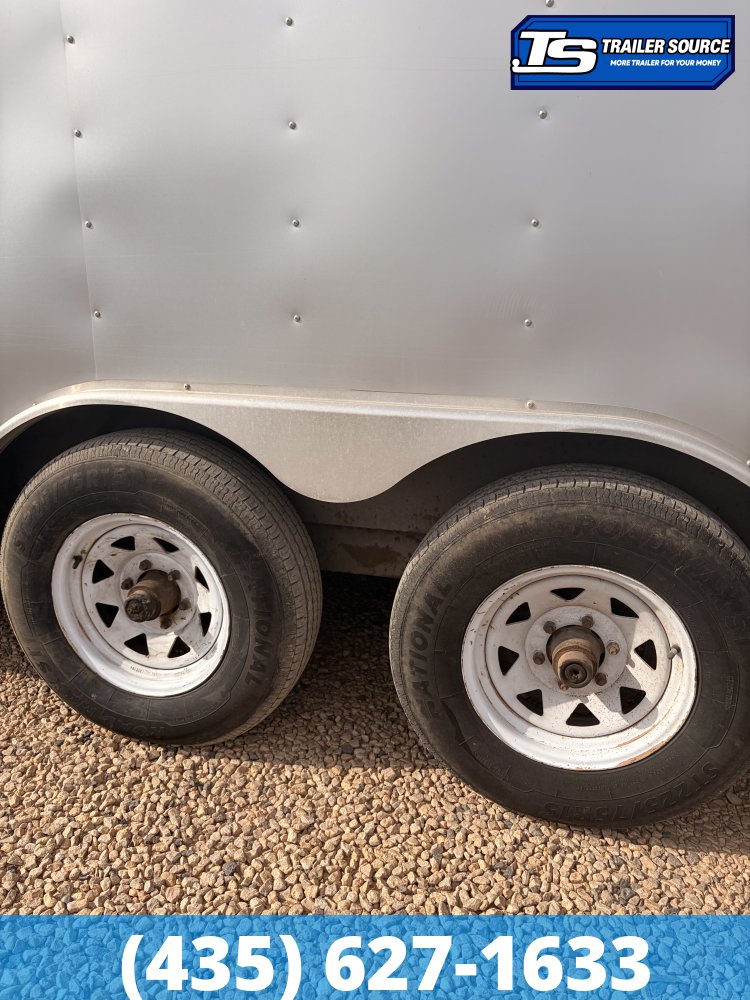 8.5x24 Haulmark Transport Enclosed Cargo Trailer - 10K GVWR - Lower Cabinet, Roof Vent, Stabilizer Jacks, Upper Cabinet