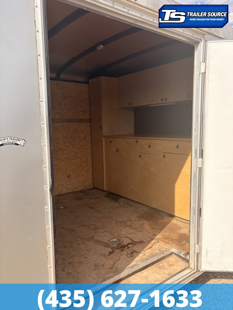 8.5x24 Haulmark Transport Enclosed Cargo Trailer - 10K GVWR - Lower Cabinet, Roof Vent, Stabilizer Jacks, Upper Cabinet