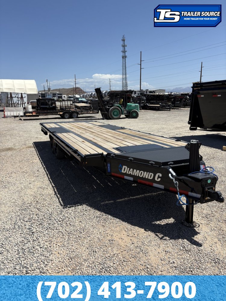 8.5x24 Diamond C DET 210 Deckover Tilt Trailer - 23K GVWR - D-Rings, Hydraulic Jack(s), Oak Floor, Pop Up Winch Package, Slide Track, Solar Panel, Spare Tire