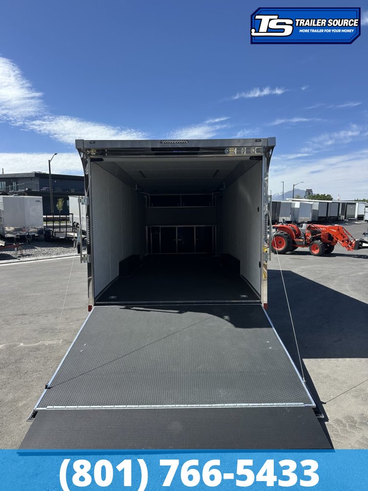 8.5x24 Wells Cargo Revv Enclosed Car Hauler Trailer - 7'0" Interior - 10K GVWR - .080 PolyCor, Alloy Wheels, Barlock on Door, Rear Spoiler w/ Load Lights
